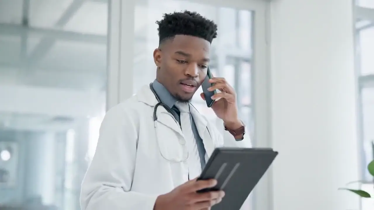 A Welo doctor consulting on a tablet